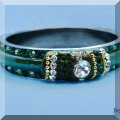 J44. Dark green rhinestone bangle bracelet. Missing beads.- $12